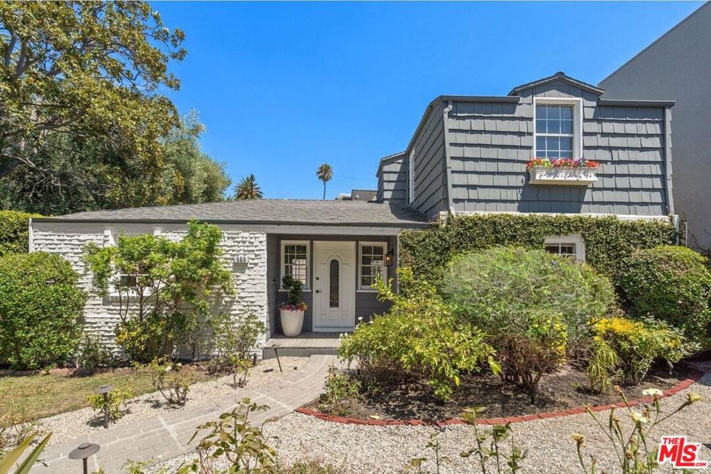 " Le Cottage " Tucked behind lush privacy hedges on a prime corner lot in the heart of West Hollywood, 560 N Croft Ave blends timeless charm with thoughtful modern updates. This 4-bed, 2-bath home features an updated kitchen with brand-new stainless steel appliances, a formal dining room, a cozy breakfast nook, and abundant natural light throughout. The detached two-car garage comes equipped with EV charging, while the private yard offers a serene escape. All of this is just steps from Melrose Place and its iconic cafs, restaurants, and boutiques, including Alfred Coffee, Catch LA, and EP & LP. FIREPLACES ARE DECORATIVE ONLY .