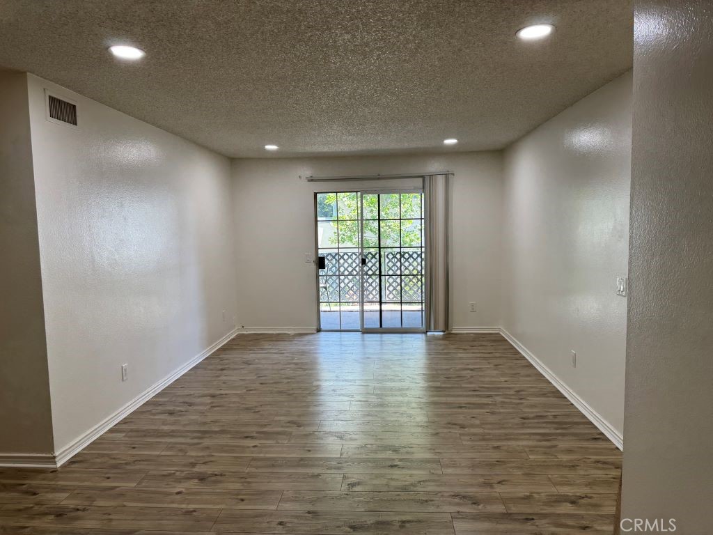 Wonderful upstairs unit. Master bedroom with bathroom has large walk in closet, upgraded kitchen, recess lights, new carpet and paint. HOA provides pool/ spa, laundry facilities, water/ trash pick-up, and maintenance of grounds and building roof and exterior. This gated community offers fantastic amenities, including a pool and laundry room, maintained landscaping. minutes from shopping, dining, parks, and easy freeway access. Great rental investment opportunity.