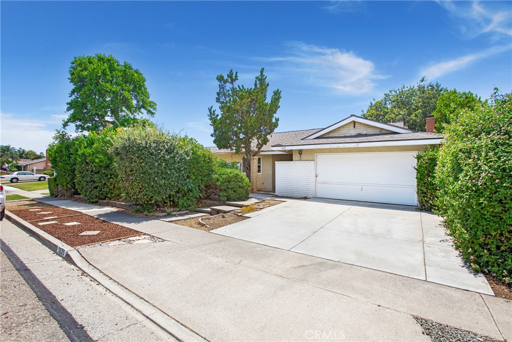 What an incredible opportunity to turn this hidden gem into your dream home! Offering 2,096 square feet of living space, this 4-bedroom, 2.5-bath single-family residence provides plenty of room to spread out and make it your own. A distinctive double-door entry sets a welcoming tone, while charming retro features offer a nostalgic touch—ready to be embraced as-is, updated with modern flair, or reimagined entirely to suit your style. The home features generously sized rooms that provide the perfect canvas for your vision. The galley kitchen offers ample prep space and, with a bit of remodeling, could easily be opened up to create a spacious kitchen, dining, and family area. A two-car garage adds convenience, and the low-maintenance yard makes upkeep a breeze. Located in highly desirable Placentia, this home offers the best of both worlds, a vibrant, amenity-rich community with great schools, shopping, and recreation, all within about 20 miles of the beach.