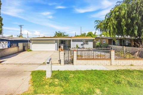 Photo of 915 Stichman Avenue, La Puente, CA 91746 (MLS # CV26086329)