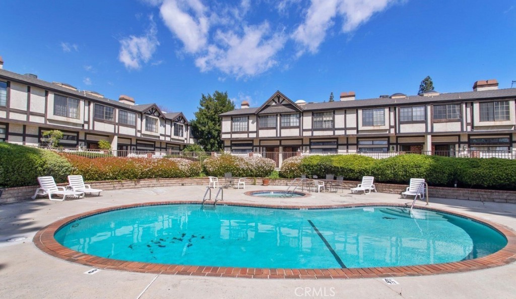 BUY THIS TOWNHOUSE WITH 1% DOWN-SEE SUPPLEMENTS. The seller is willing to negotiate either closing cost or 2-1 buy down interest. Split Level Windsor Park Townhouse! This 3 BR/3 BA End Unit Offers w/Open Concept Floorplan Offers a Huge Front Patio off Living Room & Sweet Balcony off Kitchen/2nd Level to Create 2 Great Outdoor Experience Perfect for Entertainment & Al Fresco Dining! New Wood Flooring on Lower Levels! Cook’s Kitchen! Fireplace in Living Room w/High Ceilings, Formal Dining, Breakfast Eating Area, Family Room, There’s So Much Space! Huge Master Bedroom w/Vaulted Ceilings and End Suite Bath w/Separate Tub & Shower! Attached 2 CAR Garage w/DIRECT Access to the Unit! 2 additional bedrooms, a full bathroom and a full size laundry area. Tons of Closet Space & Storage! Lots of Natural Light & Only 1 Common Wall! Well Maintained Complex w/Sparkling Pool, Spa, Controlled Access Gates & Lots of Guest Parking. Low HOA Dues includes water, trash & sewer! Situated between the Northridge Fashion Center and Topanga Westfield Mall. Welcome home! THIS is an END Unit off of ROSCOE BLVD. There are 3 entrances on Roscoe to the Complex, this unit is located at the Entrance closest to Kelvin. More pics. coming soon.