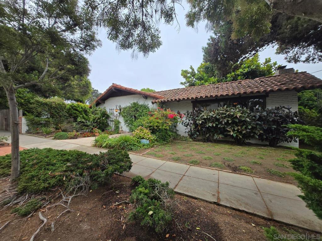 This Spanish-style 3-bedroom, 2-bathroom mostly single level furnished home for lease in Bird Rock is just three blocks from the Pacific Ocean. The house features classic adobe walls, clay roof tiles, and a landscaped front yard. Inside, you'll find an open layout with large windows, parquet hardwood and tile floors, a fireplace, and a remodeled kitchen with quartz countertops and stainless-steel appliances including large capacity washer/dryer combo in separate laundry area. All bedrooms have spacious closets, with the primary suite offering a private remodeled bathroom and walk-in shower. Patios off the primary bedroom and off the dining room are great for outdoor relaxing and dining. A level 2, 240-volt EV charger is installed for electric vehicles. Bird Rock is a friendly, walkable neighborhood close to beaches, parks, shops, and schools including the famous Bird Rock Elementary. This comfortable and updated home is ready for you to move in and enjoy everything the community has to offer. Lease offered for 8 months from October 2, 2025.