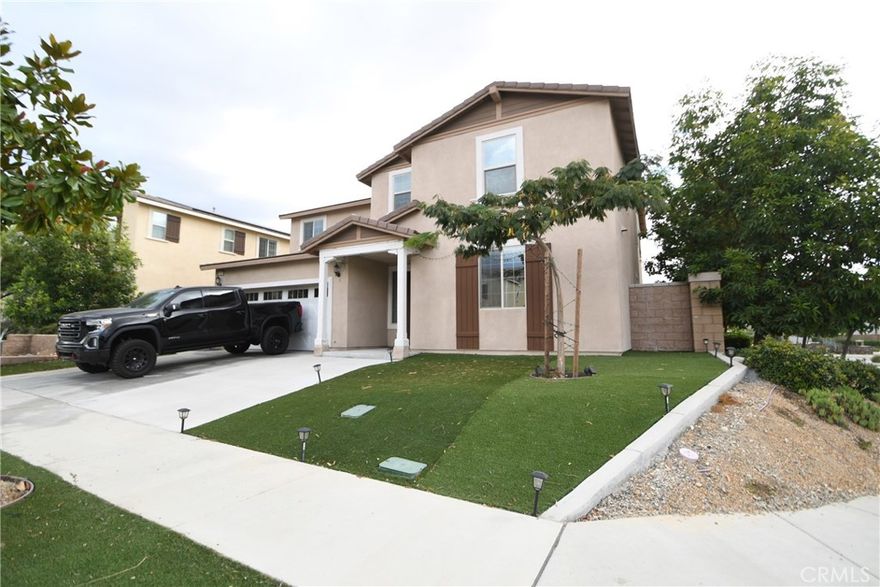 Stunning 5 bedroom, 4 bathroom single family home in the desirable Summit at Gabion Ranch community of North Fontana, built in 2022 with modern elegance and family friendly design. This spacious 3,194+ sq ft residence boasts an open concept gourmet kitchen featuring stainless steel appliances, a large island with seating, and a walk in pantry, seamlessly flowing into a formal dining area, perfect for entertaining. The thoughtful floor plan includes a main floor guest suite, and energy efficient upgrades, all on a generous 6685 sqft lot with a 3 car garage. Nestled in a master planned neighborhood with parks, Dog park , trails, and proximity to Gabion Ranch Park, this home offers access to top rated schools, vibrant community events, and a prime location near I-15 and SR-210 for easy commutes to Ontario Airport (10 mins), Riverside (30 mins), or LA (1 hr). Enjoy nearby dining, breweries, and outdoor adventures at Mary Vagle Nature Center, plus the growth potential of a booming area . Move in ready and priced to sell, this modern gem blends luxury, convenience, and value in one of Fontana’s most sought after enclaves.