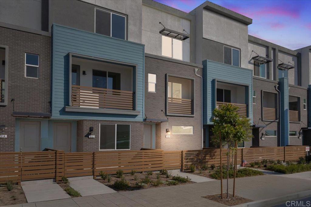 NEW RELEASE! New Construction Home with PAID SOLAR, NO MELLO ROOS, and LOW HOA — where modern living meets everyday convenience! This brand-new 3-bedroom, 3-bathroom condo offers a perfect blend of comfort, style, and smart design. Step into an open-concept living space with 9-foot ceilings, recessed LED lighting, and luxury vinyl plank flooring, flowing seamlessly from the living room to a sleek kitchen equipped with granite countertops, a large island, stainless steel appliances, and a USB charging station for your tech needs. Enjoy peace of mind with Energy Star® certification, solar energy system, smart thermostat, and MERV 13 air filtration — ideal for eco-conscious homeowners. Each bedroom is generously sized, including a bright primary suite with an ensuite bathroom and modern finishes like engineered stone countertops, dual sinks, and chrome-framed glass shower enclosures. The attached 2-car garage adds practicality, while 22 guest parking spaces make entertaining easy. Plus, enjoy the benefits of no Mello Roos and low HOA fees. Perfectly located just minutes from Sharp Grossmont Hospital, SDSU, USD, and Cuyamaca College, and only a 10-minute drive to downtown San Diego or the Mexican border, this home makes commuting a breeze with easy access to I-8, Hwy 67, and I-125. Whether you're a first-time buyer, downsizing, or investing, this turnkey home checks all the boxes. Come see why Gateway is the perfect place to call home!