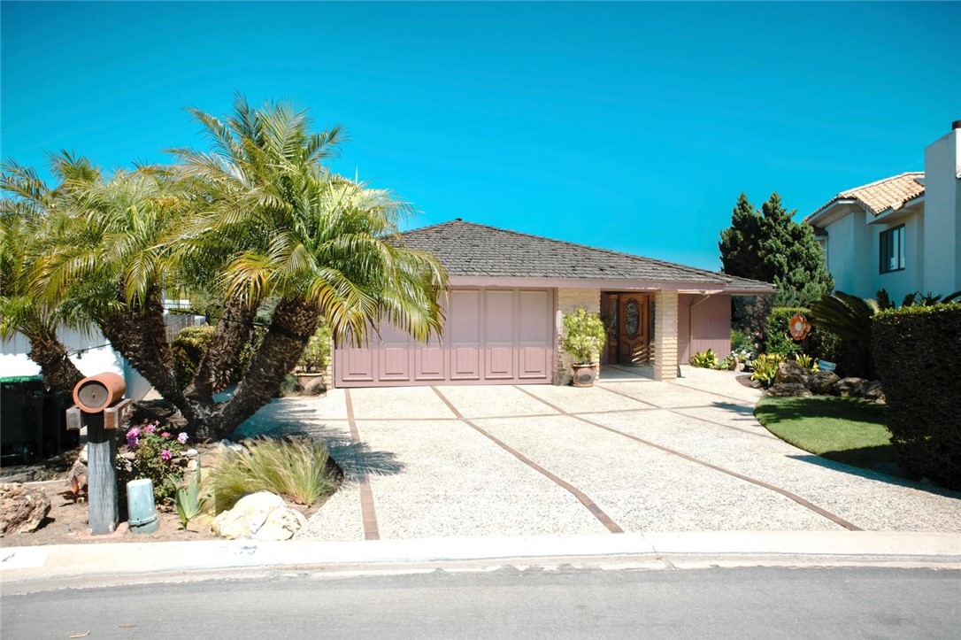 Located in the prestigious Cliff Haven neighborhood of Newport Beach, this contemporary coastal residence offers elegance, privacy, and stunning views. Perched on a slope in a quiet cul-de-sac, the home spans approximately 2,576 square feet of refined living space on a generous 10,000 sq ft lot. The main level features 2 bedrooms and 2.5 bathrooms, with an open-concept layout that maximizes natural light and showcases sweeping ocean and harbor views. The lower level includes a versatile family room with a convenient half bath, perfect for entertaining or relaxing in comfort. Enjoy the tranquility of one of Newport Beach’s most sought-after communities, located within a top-rated school district and just minutes from the beach, local shopping, and world-class dining. This is a rare opportunity to own a beautifully positioned home in Cliff Haven.