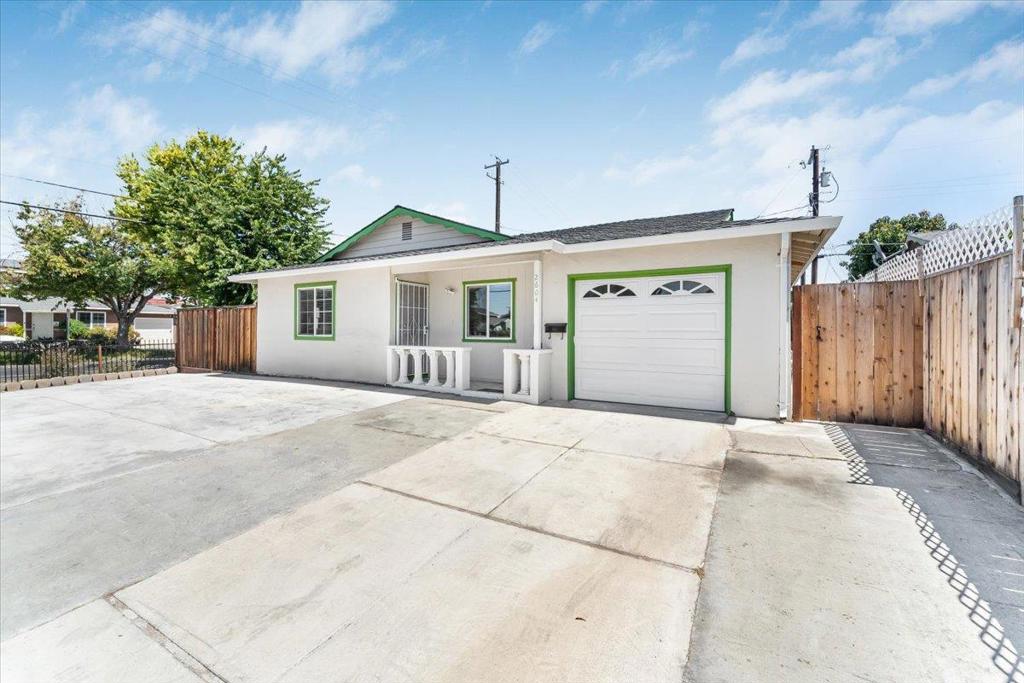 Welcome to this charming home located in the vibrant city of San Jose. This residence offers 1,043 sq ft of living space, featuring 4 bedrooms and 2 full bathrooms. The heart of the home is the kitchen, equipped with modern quartz countertops, seamlessly flowing into the family room for an open and inviting atmosphere. Central AC and central forced air heating ensure year-round comfort, while stylish and low-maintenance vinyl/linoleum flooring runs throughout the home. Recent upgrades provide peace of mind, including a brand-new AC system and a 1.5-year-old Presidential-grade shingles roof, known for its durability and high-end appearance. The kitchen has been completely renovated with recessed lighting, updated countertops, modern cabinetry, and tile flooring. Both bathrooms have been beautifully updated with contemporary finishes. Double pane windows enhance energy efficiency and reduce noise, while a newly installed fence in select areas adds privacy. An automatic one-car garage door offers added convenience. This delightful home sits on a spacious 5,900 sq ft lot, providing ample room for outdoor enjoyment in a highly sought-after location.