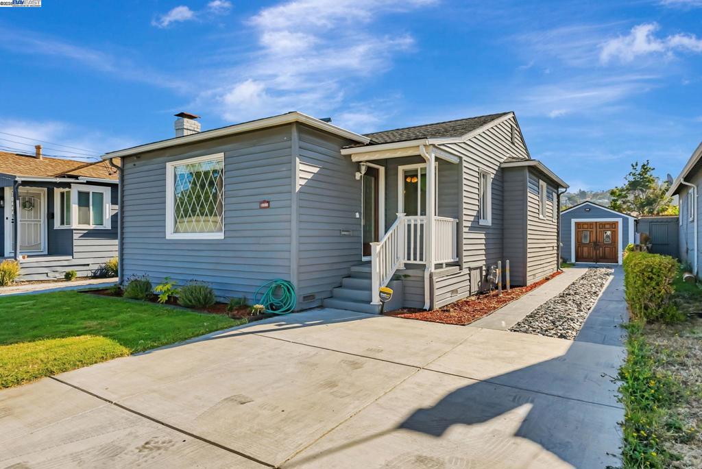 Open house Sat & Sun 1-4 pm. Charming & cozy 2 bedroom, 1 bathroom home with a detached bonus space. Meticulously maintained with recent upgrades throughout, this single-level residence features new interior/exterior paint, double pane windows, refinished oil-stained hardwood floors, updated wood baseboards & trims, upgraded electrical, newer French drain and sump pump system, 2-year old "cool" roof with a 50-year transferable warranty, and much more. The driveway’s parking area has been repaved with a durable 6-inch slab, while the extra-long driveway path to the garage is tastefully accented with new chili bar slate chips. The detached 1-car garage (~200 sq ft) has been converted into a versatile bonus space featuring French doors, a newer roof, windows, and electrical. Excellent potential for an ADU, home gym, or office. Located on the Oakland/San Leandro border with convenient access to shopping, HWY 580, and public transportation.