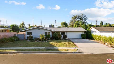 Photo of 16855 Donmetz Street, Los Angeles, CA 91344 (MLS # 26874783)