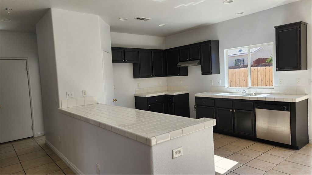 Photo of 14601 Apache Dr, Victorville, CA 92394 (MLS # WS26084284)