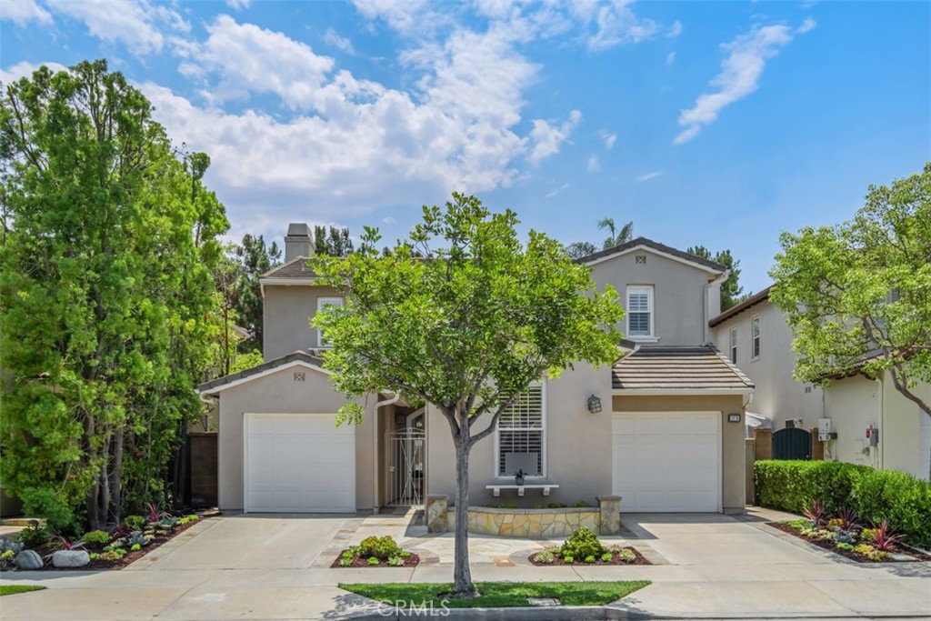 Nothing compares to this up-to-date recently remodeled home completed just weeks ago. A definite 10 plus! Nothing on the market like it. Gated entry to the community, gated courtyard entry to the home. A private Casita with its own entrance and full bathroom. Lovely wood floors. (No carpeting anywhere!) Fireplace with a cozy recently added raised heath. The kitchen is amazing - new appliances, new quartz counter tops, an island, under counter lighting and a full dining area. Upstairs - a huge master bedroom and bath as well as two other bedrooms and a real laundry room! Don't forget the incredible and very large backyard with a Zen area for chilling as well as room for entertaining. 3 full baths and one half bath. You will love this property! Oak Creek residents enjoy a community pool, spa, parks, tennis courts and beautiful walking trails. Easy walking distrance to the Oak Creek Shopping Center for great dining, shopping and a fitness club. Convenient freeway access to the 405, 5 and the 133. A 15 minute drive to Laguna Beach! Five minutes to the John Wayne Airport and the Spectrum! This home is spotlessly clean, one of a kind fabulous and priced right! Ask for a tour. You won't want to leave.