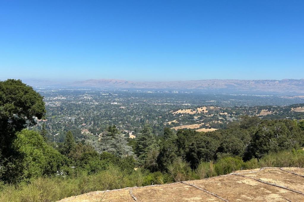 Top-of-the-world view property! Forever-Breathtaking Panoramic Views of the Entire Silicon Valley Floor from San Jose to San Francisco and the surrounding mountains! Buyer can redesign plans to their specifications, current plans include an open concept floor plan, high ceilings, state of the art design. Two sets of plans exist, 7,985 sf home or 4,641 sf. (The larger home includes 4-Bedroom, 6-Bath, Dining, Family Room, Workout Gym, Home Theater, Library, Lanai, including guest ADU with 1,110sf. Proposed Building Floor Area, lower floor 2,279sf - upper floor 4,105sf - Garage 457sf. Main House is 7,985sf plus ADU, Totals 9,095sf.) (The smaller design has proposed 2,845sf upper level, with large primary suite, open living, dining, kitchen, office, and 3-car garage with 845sf, and a total of 3,951sf lower level with a second primary suite, 3 bedrooms, laundry, and elevator, Total 4,641sf.) Only minutes to downtown Los Gatos or Blossom Hill Rd.