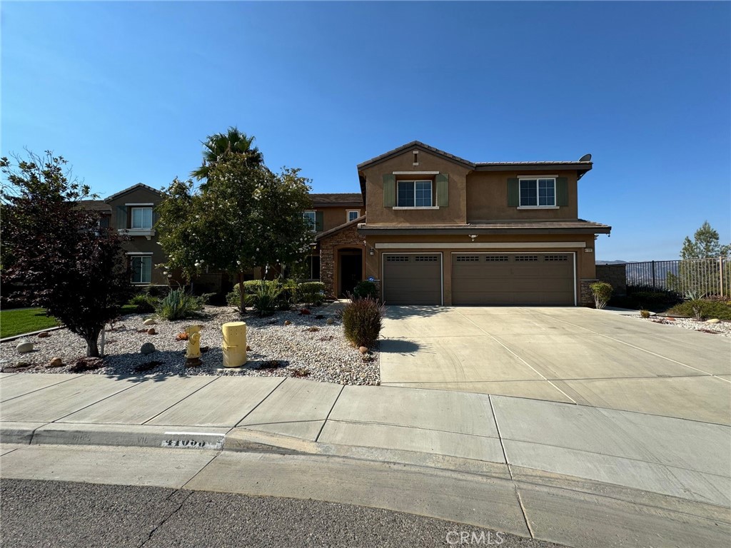 Beautiful 5-Bedroom Home with Solar in Rosetta Canyon – End of Cul-de-Sac with Stunning Mountain Views. Welcome to this well appointed home. Enjoy unobstructed views of the Lake Elsinore mountain range right from your doorstep! Property Highlights:
Spacious Layout: Over 5 bedrooms, including a convenient downstairs bedroom with a full bath – ideal for guests or multi-generational living.
Gourmet Kitchen: Open-concept design with a center island, recessed lighting, and stainless steel appliances.
Energy Savings: Equipped with solar panels to help reduce utility costs.
Luxurious Master Suite: Features two walk-in closets, a relaxing Roman tub, and a separate walk-in shower.
Versatile Bonus Room: Upstairs loft can be transformed into a game room, media room, or even a 6th bedroom.
Prime Location: Quiet end-of-cul-de-sac setting for added privacy.
Rosetta Canyon residents enjoy well-maintained parks, sports courts, and easy freeway access, all just minutes from shopping, dining, and outdoor recreation at Lake Elsinore.