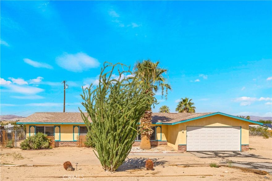 Deal Alert-Large Home! Located in the desirable Ben Hunter tract on an extra-wide/double lot, this spacious three Bedroom, 2 Bath home offers a large Living Room and a separate Family Room. The Kitchen and Bathroom Cabinets need to be updated, but that is reflected in the low price. Central Heating and Air Conditioning, plus an available Evaporative Cooler for optional cooling is a plus! The Two-Car Garage is extra wide and is partially finished inside. With built-in equity, you can fix this great home up, just  the way you have always dreamed! Conveniently located near Luckie Park, area restaurants, houses of worship, and Adobe Rd that leads to the Marine Corps Base in 29 Palms. Your great new start begins here!