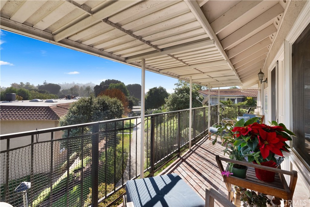 No Steps to Unit! No One Above! - Beautiful Remodeled Casa Vista with Views! ~ Very Light and BRight! ~ End Unit ~ Remodeled Kitchen and Baths ~ French Sliders from Living Room and Bedroom ~ Large Primary Suite with Walk-In Closet ~ Washer/Dryer Included ~ Association fee includes water/sewer/trash/cableTV ~ Laguna Woods Village has over 2100 Acres of Rolling Hillsides in Desirable South Orange County - Voted Best Senior Living Community by the OC REgister - 24 Hour Security - Two Professional Golf Courses - Beautiful Restaurant and Bar that Overlooks the Golf Course - 5 Pools including a Lap Pool and Swimming Pool Hours for Children - Community TV Channel with Exclusive Prog - 2 Comm Gardens - 7 Unique Clubhouses - 814 Seat Performing Arts Theatre - Professional Workshops including Jewelry, Slip Casting, Woodworking, Ceramics, Photography and More- Equestrian Center with 38 Stables for horse boarding, riding ring, & guided trails rides, Library & History Center, Bus Transporation w/ Fixed Routes & On Demand Transportation - over 250 Clubs & Organizations - Close to Laguna Beach,Shopping Mall,Hospital ~