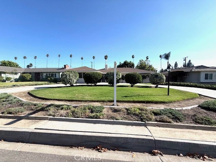 Price Improvement, very motivated seller.  Location, location, location.  Welcome to this spacious and gorgeous 3-bedroom, 2.5-bath home, nestled on a picturesque tree-lined street in the heart of Glendora. Combining timeless charm with spacious living, this single-story residence sits on a generous 10,003 sq ft lot and offers incredible potential along with a warm, inviting atmosphere from the moment you arrive. A circular driveway and lush, manicured landscaping set the tone, while classic brick detailing around the chimney adds to the home’s curb appeal. Inside, you are greeted by a light-filled living room with a dual-sided fireplace, creating a cozy yet elegant focal point. Property has been total remodeled inside out with new bathrooms, new kitchen, new floorings, new paint inside and out, new lighting, new kitchen appliances and so on. The space flows effortlessly into the dining area—perfect for entertaining or enjoying quiet family dinners.  The adjacent family room exudes character with rich wood paneling, exposed beam ceilings, and a floor-to-ceiling stone fireplace. Sliding doors lead to a covered patio, ideal for morning coffee or evening gatherings, all overlooking the expansive backyard with a lush lawn and mature trees that offer privacy and shade. The kitchen has a large front-facing window that fills the space with natural light. A dedicated laundry room adds convenience to everyday living. Each of the three bedrooms is generously sized and one is a master suite, while the two and half bathrooms are functional and brand new. Located just minutes from schools, local parks, and the vibrant Glendora Village, this is a rare opportunity to own a home on a big lot in a highly sought-after neighborhood. Please come by and check it out this wonderful property.