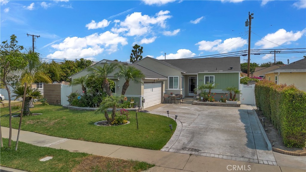 Welcome to this beautifully updated home located in the highly desirable northeast Downey neighborhood. Thoughtfully remodeled, this residence blends classic charm with modern upgrades, offering comfortable living in a serene residential setting. The interior features a bright and spacious floor plan, highlighted by a tastefully renovated kitchen with sleek countertops and custom cabinetry. The living and dining areas flow seamlessly, providing an ideal space for both everyday living and entertaining.
The three bedrooms offer comfort and flexibility, while the upgraded bathroom showcases contemporary finishes and quality craftsmanship. Additional highlights include recessed lighting, newer flooring throughout, and central heating and air conditioning for year-round comfort.
Step outside to a private backyard, perfect for relaxing or hosting gatherings. The attached two-car garage and wide driveway offer ample parking and storage. Conveniently located near parks, schools, shopping, dining, and close to the freeways, this move-in-ready home is a rare find in one of Downey’s most sought-after communities. The property is contingent on the sellers finding a replacement property.