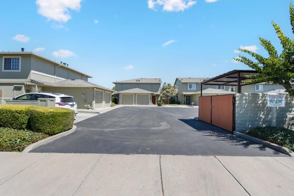 Welcome to this delightful 3-bedroom, 2-bathroom home in the charming city of Hollister. Boasting a spacious 1,330 sq. ft., this residence offers comfortable and convenient living with a minimum lot size. The family room is seamlessly connected to the kitchen, creating a cozy atmosphere perfect for gatherings. The kitchen features a self-cleaning oven, making meal preparation a breeze. Enjoy the convenience of central AC and central forced air heating, ensuring comfort throughout the year. The home features attractive amenities, including high ceilings that add a sense of openness. The flooring combines carpet and laminate for a balanced design. A fireplace adds warmth and charm to the living area. Spacious backyard offers ample space for family BBQ's and outdoor entertaining! Laundry is conveniently located in the garage. This property falls within the Hollister Elementary School District. Don't miss the opportunity to make this wonderful Hollister home your own.