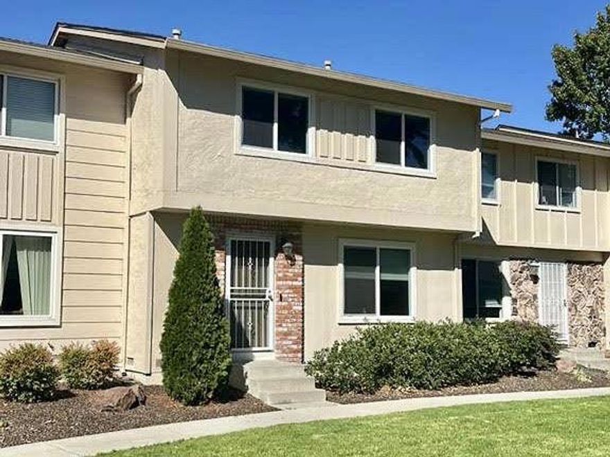 Move-in ready townhome in a prime Pleasanton location with top-rated schools! This beautifully updated 4-bedroom, 2.5-bath home welcomes you with an open-concept layout that seamlessly connects the living room and formal dining area. The bright, contemporary kitchen features recessed lighting, bar seating, and a spacious breakfast nook. Sliding glass doors open to a cozy private patio with additional storage and convenient rear access. Upstairs, all four bedrooms and two full bathrooms are thoughtfully arranged for privacy, including a primary suite with an ensuite bath. Additional highlights include an in-unit washer and dryer, upgraded flooring and bathrooms, a newer furnace and air conditioner, dual-pane windows, and fresh interior paint. Fantastic central location close to shopping, parks, freeway access, and top-rated Pleasanton schools. A must-see!