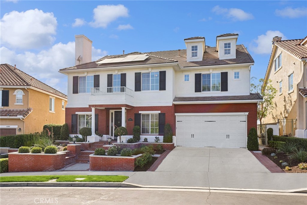 Welcome to your dream oasis nestled in the coveted guard-gated community of Stoneridge, where elegance meets modern living. This stunning single-family residence of 4,028 sq. ft boasts 5 bedrooms, 3 bathrooms on a 5,580 sq. ft. lot with VIEWS of BEAUTIFUL MISSION VIEJO LAKE & CITY LIGHTS. 3 Car Tandem Garage, Energy Efficient with 29 OWNED SOLAR PANELS installed in 2023. The heart of the home features soaring ceilings in the formal entry, complemented by a living room with a relaxing fireplace and an additional room right across the way that is a perfect space for an office, music room, or an extra bedroom. To add to the convenience, there is an additional downstairs bathroom with a walk-in shower.
Entertain with ease as the dining room flows into a well-appointed kitchen, complete with a butler's/coffee area, walk-in pantry, and an open layout that merges seamlessly with the inviting family room. Featuring a second cozy fireplace to gather with family/friends to enjoy evening TV and conversation. Next to the family room is a convenient second staircase that leads up to the expansive second floor. The luxurious primary suite offers double-door entry, dual walk-in closets, an en-suite bath with separate vanities, a large walk-in shower, and a soaking tub. Step out onto your private balcony for breathtaking views of Mission Viejo Lake and surrounding vistas. FOUR additional bedrooms share a hallway bath equipped with dual vanities and a separate bathing area.
The THIRD floor unveils an enormous bonus room, ready for personalization—make it a gym, game room, or guest haven. IMPRESSIVE FEATURES include 29 OWNED SOLAR PANELS installed in 2023, 2 Newer A/C Units(2022), TANKLESS WATER HEATER(2024), NEWER DOUBLE OVENS (2021), Dishwasher (2021), and NEWER WASHER/DRYER (2023) that can stay with the home, plus an EV CAR CHARGER and Plantation shutters for that extra touch of class.
Outside, enjoy the hardscape backyard with an Outdoor BBQ with seating, perfect for hosting and enjoying the scenic lake and city light views. This home is not just a residence; it's a lifestyle upgrade, complete with upcoming TERMITE/SECTION 1 & 2 CLEARANCE (Sept. 2025). HVAC TUNE UP (JULY 2025) and ROOF TUNE UP(August 2025). This home has so much! This home is close to Shopping, Toll Roads, parks, Schools, and Lake Mission Viejo. No Mello-Roos!