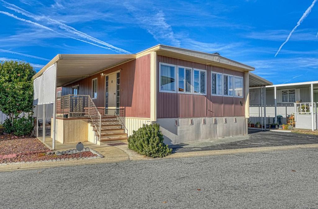 55+ Senior Community Welcome to this charming 2-bedroom, 2-bathroom mobile home surrounded by shops and restaurants. Spanning 1,144 sq. ft., this residence offers a comfortable, convenient, super-size living room. The spacious kitchen features a gas cooktop, built-in oven, dishwasher, refrigerator, garbage disposal, and a hood over the range. The dining area is perfect for enjoying meals with family and friends. The home boasts a variety of flooring, including carpet, updated laminate, and vinyl/linoleum, providing a blend of comfort and practicality. Stay cozy during cooler months with the central forced air heating and cool off in the summer with the wall-mounted air conditioner. The primary bedroom features a walk-in closet, adding to the home's ample storage options. The bathrooms offer a stall shower and tub option. Other amenities include Indoor laundry with a washer and dryer, dual-pane windows, and low-flow fixtures. This mobile home is located close to Hwy 101 and within walking distance from Northridge Mall Don't miss the opportunity to make this delightful home your own!