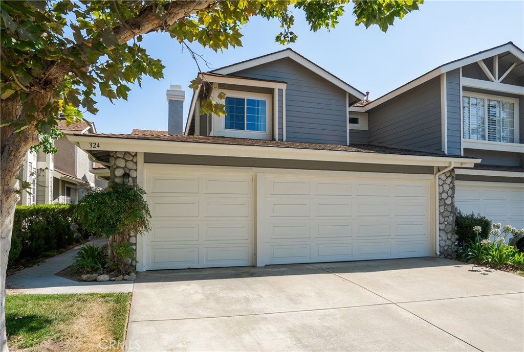 Homeowner is a very motivated seller of this beautiful 4 bedroom- 3 bath townhouse in the extremely desirable "Village at San Dimas". This home has been fully remodeled with added extras you have to see to really appreciate the extra comfort/convenience they will add to your life. No carpet, all tile and waterproof vinyl floors. This makes any cleanup a breeze. Bathrooms have all been upgraded to perfection. You have newer double paned glass windows throughout the house. The patio door and a large garden window in the kitchen are also doubled E pane glass. The double pane windows are GREAT for keeping the inside of the house cool in the summer and nice and warm in the winter-very energy efficient. One very unique feature to this house is having your own PRIVATE ELEVATOR! Besides the obvious use for the elevator one can also transport luggage, laundry and so many other items instead of having to carry them up and down the stairs. The house also comes equipped with a whole house water softening system. No more hard water stains to worry about. Once you have a whole house water softener you can't go back. Your clothes, hair and skin will all be cleaner and softer. The house also has a whole house fan. It efficiently and inexpensively cools your home so you don't have to run the AC at night. You will be pleasantly surprised at what a difference it makes. The master bedroom is HUGE with an amazing walk in closet. The other 2 upstairs bedrooms are good sized and have a lot of natural light. Also upstairs is a good sized loft that could be used for an office/play area, etc. Downstairs bedroom is good sized, bath has walk in shower. Some of the other features of this home include a newer central heat and air system, high ceilings, colonial doors, indoor laundry, 3 car garage and copper plumbing throughout. There are just too many nice things to say about this home. This property is in a very desirable location in the community- in a tucked away part of the complex. The backyard is very private and low maintenance. Amenities in "The Village" include 2 pools/ spa areas, sport court, club house, a playground for the kids and a lot of side walks to enjoy the lush landscape of the community. This magnificent home is located in the very desirable Bonita School District and is close to parks, shopping, restaurants, schools, walking trails Bonellia Park, Raging Waters, Citrus College Mt. Sac. Claremont College and has great Freeway access. Don't miss out on this one!!