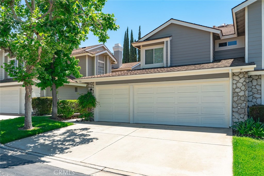Homeowner is a very motivated seller of this beautiful 4 bedroom- 3 bath townhouse in the extremely desirable "Village at San Dimas". This home has been fully remodeled with added extras you have to see to really appreciate the extra comfort/convenience they will add to your life. No carpet, all tile and waterproof vinyl floors. This makes any cleanup a breeze. Bathrooms have all been upgraded to perfection. You have newer double paned glass windows throughout the house. The patio door and a large garden window in the kitchen are also doubled E pane glass. The double pane windows are GREAT for keeping the inside of the house cool in the summer and nice and warm in the winter-very energy efficient. One very unique feature to this house is having your own private elevator! Besides the obvious use for the elevator one can also transport luggage, laundry and so many other items instead of having to carry them up and down the stairs. The house also comes equipped with a whole house water softening system. No more hard water stains to worry about. Once you have a whole house water softener you can't go back. Your clothes, hair and skin will all be cleaner and softer. The house also has a whole house fan. It efficiently and inexpensively cools your home so you don't have to run the AC at night. You will be pleasantly surprised at what a difference it makes. The master bedroom is HUGE with an amazing walk in closet. The other 2 upstairs bedrooms are good sized and have a lot of natural light. In addition to the 3 bedrooms upstairs there is a good size loft area that could be used for an office or play area for the kids. Some of the other features of this home include a newer central heat and air system, high ceilings, colonial doors, indoor laundry, 3 car garage and copper plumbing throughout. There are just too many nice things to say about this home. This property is in a very desirable location in the community- in a tucked away part of the complex. The backyard is very private and low maintenance. Amenities in "The Village" include 2 pools/ spa areas, sport court, club house, a playground for the kids and a lot of side walks to enjoy the lush landscape of the community. This magnificent home is located in the very desirable Bonita School District and is close to parks, shopping, restaurants, schools, walking trails Bonellia Park, Raging Waters, Citrus College Mt. Sac. Claremont College and has great Freeway access. Don't miss out on this one!!