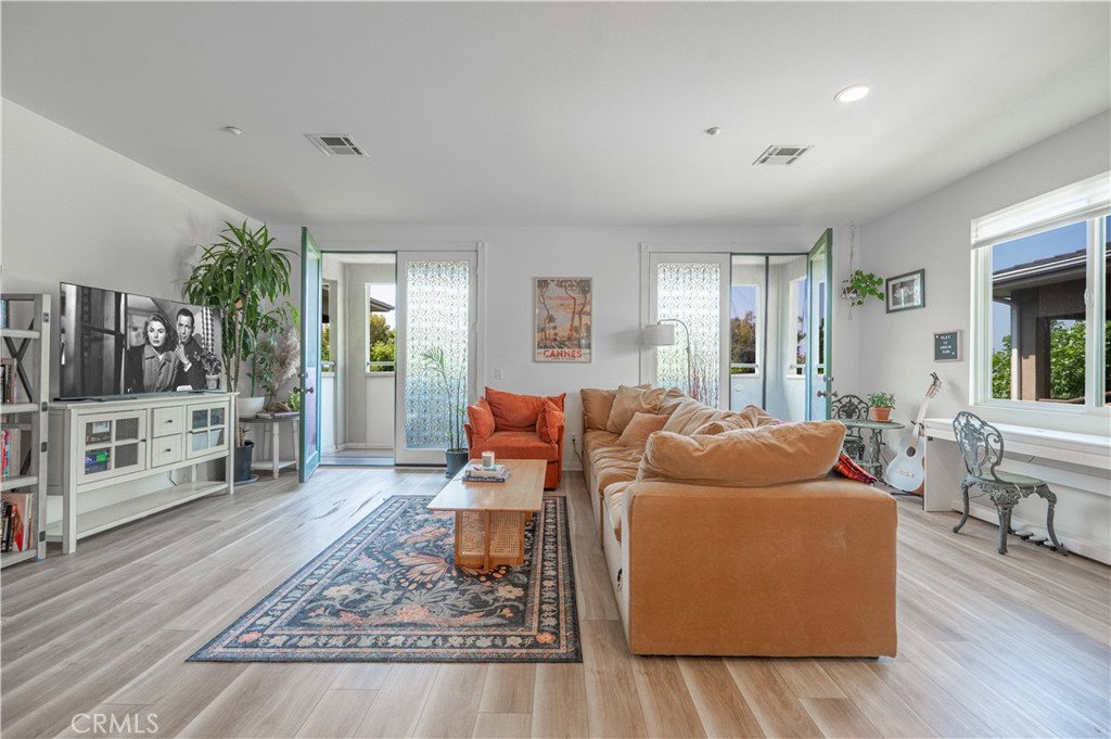 Tucked quietly in the back of a beautifully maintained Craftsman-style community, this updated two-story townhome offers rare privacy, modern style, and exceptional convenience. Step inside and feel an immediate sense of calm, where airy, light-filled spaces, wide-plank wood-look floors, and oversized windows create a warm, welcoming atmosphere.
The spacious living room flows seamlessly into a wraparound kitchen featuring white shaker cabinetry, quartz-style countertops, stainless steel appliances, and a crisp tile backsplash. Just beyond, a full-length private balcony with two separate access points extends your living space outdoors—perfect for morning coffee, quiet evenings, or container gardening.
Upstairs, you’ll find two generously sized bedrooms and two full bathrooms, including a serene primary suite with a walk-in closet and a freshly remodeled en-suite bath. All bathrooms boast modern vanities, quartz counters, LED-lit mirrors, and timeless finishes.
Every day ease is built right in: enjoy in-unit laundry with full-size washer and dryer, and direct access to your private two-car tandem garage below.
Set within a gated community built in 2010, with beautifully landscaped walkways and welcoming curb appeal, this turnkey home is minutes from Old Town Pasadena, the Rose Bowl, Caltech, JPL, and the 210/134 freeways.
Whether you're seeking a peaceful place to land or a home that simply feels right, this one stands apart from the rest.