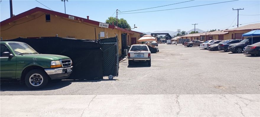 Double your money!  Not a vacant lot.  See MLS # EV22183081, see all the photos, it is zoned commercial, seller has a Commercial property rental business license, it is already income producing property, you have the work done for you, sits on 1.20 acres, plenty of parking, fenced, and it has gated entry.  location location!!  Near airport/Amazon/shopping/schools /easy freeway access.  ARE you looking to maximize your profit? So much potential to increase current rents and making ways to making more spaces rented. looking for an easy way to make income? Seller will be willing to carry. with considerable down, will also consider discounting price for an all-cash offer, Call for more details. Storage building has become highly attractive due to their ability to generate stable, predictable income streams, the demand for storage units is great! 28 storage units PLUS two bedrooms, one bath apartment, fully functional apartment for manager or? Previous seller used to live in the apartment when in town, additional storage with laundry hookups, belong to the apartment, use your imagination to rent separately for more income, some storage units have own 1/2 private baths, and one common 1/2 bath for all remaining tenants in the property, total of nine, plus the 3/4 bath in apartment. build your equity, easy to manage, save on time and money, steady rental income, some tenants have been there for more that 10 years.