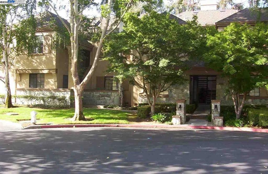 Welcome to your serene retreat in a quiet, gated community — where nature, comfort, and privacy come together. This beautifully maintained 2-bedroom, 2-bathroom home offers breathtaking views of the golf course, rolling hills, and towering trees, all from the comfort of your own wooden balcony. Inside, the open-concept living space features a cozy wood-burning fireplace with gas connection and sleek stainless steel appliances, combining warmth and modern functionality. Large windows flood the home with natural light, creating a bright and peaceful atmosphere throughout Whether you're sipping morning coffee while watching the sunrise over the greens or unwinding on the balcony as the sun sets behind the trees, this home is designed for relaxation and connection with nature. Location is unbeatable: Just 5 minutes to the freeway (I-680) for easy commuting Highly rated schools nearby — ideal for families Moments from San Ramon City Center, shopping, dining, and more Don’t miss the opportunity to live in one of the most tranquil and picturesque neighborhoods around.