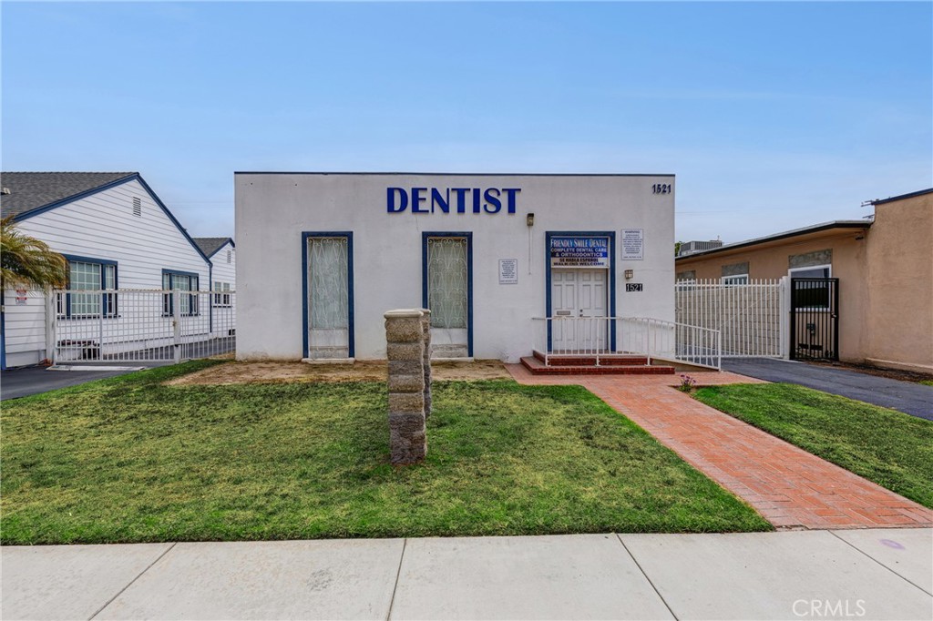 Prime Commercial Property in Santa Ana’s Midtown! Welcome to 1521 N Broadway, a rare opportunity to own or establish your professional practice in one of Santa Ana’s most dynamic commercial corridors. Ideally situated just south of 17th Street and moments from the 5 Freeway, this standalone building offers excellent visibility, high foot traffic, and convenience in a centrally located, rapidly growing area.
Formerly operating as a dental office, the property is thoughtfully designed for medical or professional use, featuring four stations with existing plumbing and electrical hook-ups, a spacious lobby area, a welcoming reception desk, a private doctor’s office, two bathrooms, a well-appointed kitchen space, and secure gated parking. The layout supports a wide range of potential configurations and uses, making it ideal for owner-users or investors looking to modernize and capitalize on the area’s continued development.
Located within the Midtown Specific Plan (SP3) and designated as an Opportunity Zone, the property benefits from the city’s long-term vision for economic revitalization and offers potential tax advantages for qualified buyers. Elevate your practice in a space that blends convenience, functionality, and a strategic location in the heart of Santa Ana’s flourishing Midtown district.