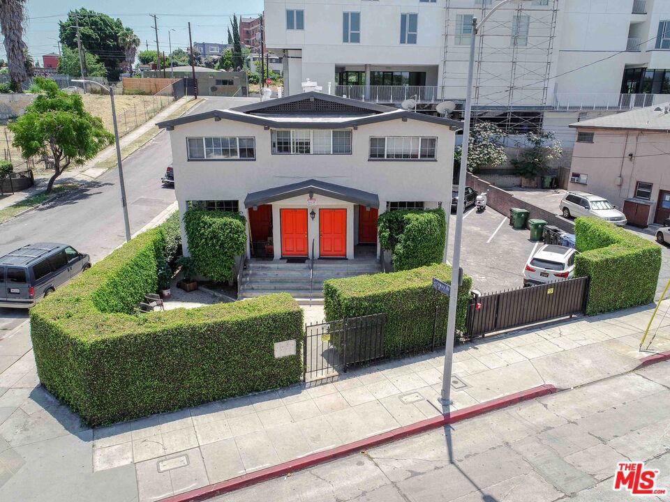 Stylish 1-Bedroom in the Heart of Silver Lake Steps from Erewhon & Sunset Junction. Discover this bright and inviting 1-bedroom unit full of charm and character, ideally situated in one of LA's most vibrant neighborhoods. Just a short stroll to Erewhon, Sunset Junction, cafes, boutiques, and local hotspots.Inside, you'll find an airy open layout with craftsman-style built-ins, hardwood floors, recessed lighting, and abundant natural light from oversized windows. The walk-in closet offers flexible use, ideal as a home office, reading nook, or even a cozy cat lounge. The kitchen is a standout, featuring quartz countertops, LG stainless steel appliances, a farmhouse sink, and stunning hand-crafted Spanish cement tile backsplash, blending old-world craftsmanship with modern flair. Enjoy the convenience of a full-size washer/dryer in-unit, plus private front and rear entrances.Relax on the wide front porch, perfect for lounging or outdoor dining. Gated property with secure parking. Pet-friendly (pets considered case by case).This thoughtfully designed unit offers comfort, character, and unbeatable location, ideal for anyone seeking the true Silver Lake lifestyle.
