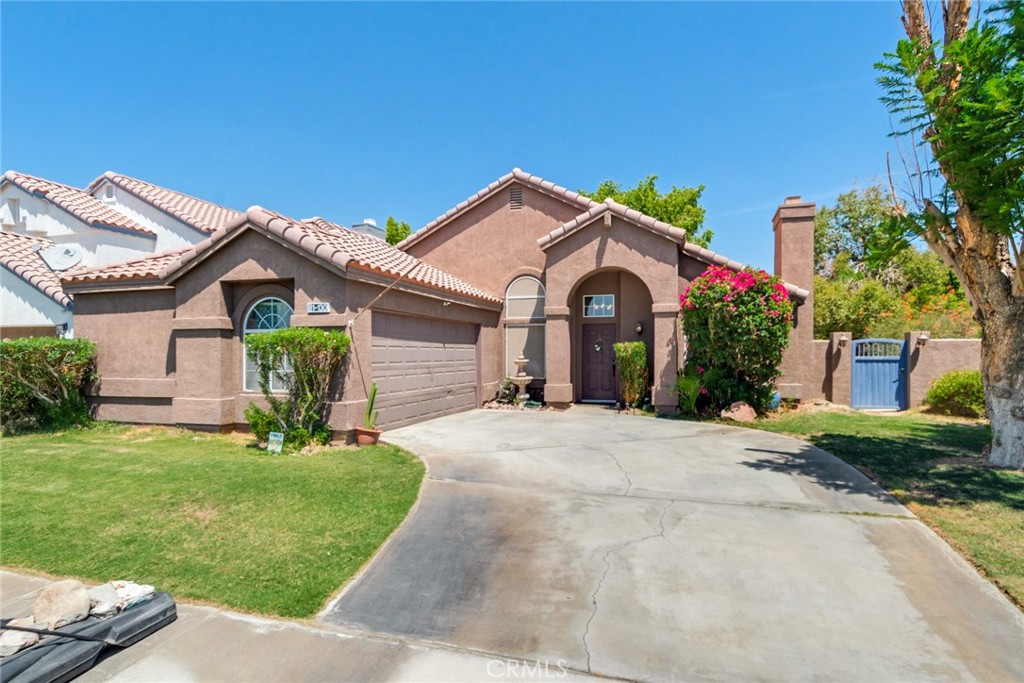 Welcome to this beautifully upgraded 4-bedroom, 2-bathroom home in the heart of Indio, CA, featuring 1,700 sq. ft. of elegant living space. Boasting rich wood flooring throughout and a cozy fireplace in the living room, this home blends modern comfort with timeless charm. Located in a prime area near shopping, dining, and entertainment, this is your perfect desert retreat!