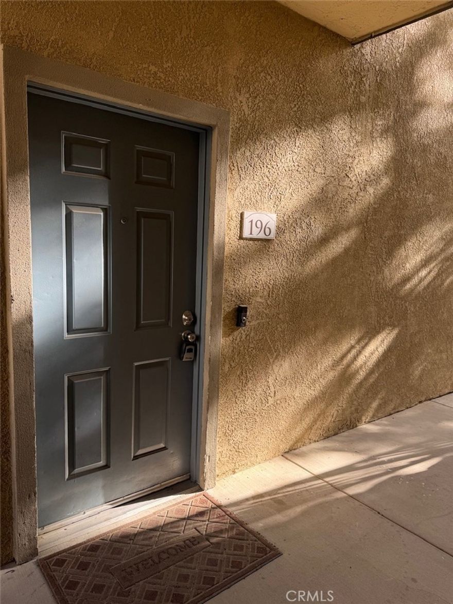 Beautiful Condo in a great community. This condo is a downstairs unit with its own private patio area. Condo has been remodeled and has modern laminate flooring, Quartz counter tops, gray cabinets, Good size bedroom. Indoor laundry by dining area. This condo has one parking spot along with a common parking area available. It also has a one car garage for your vehicle or storage. This gated community features all the club house amenities like the Sparkling pool, Sauna, Fully equipped gym with a theater, Poker room, Billiard room, Tennis courtyard and a barbeque area. This Wonderfully Maintained Complex Is Gated for Your Security and Privacy . Close to all the shops, Fine dining and the UCR College. HOA is paid by owner which also covers water and trash. Very close to Canyon Springs shopping center.