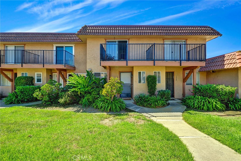 Charming upgraded townhome in a convenient location with low taxes! This home offers 2 bedrooms and 1.5 bathrooms. Completely turnkey with vinyl flooring throughout, updated kitchen and bathrooms. Cozy patio area with individual room for washer & dryer. Garage attached to patio for convenience and privacy. New fencing, newer HVAC system, and redone balcony upstairs. This is such a perfect home for first time buyers or even investors! It is located close to schools, shopping, and the freeway. Complex offers a swimming pool & spa, gym, and clubhouse and HOA covers lawn maintenance, pest control, water, trash, and sewer!