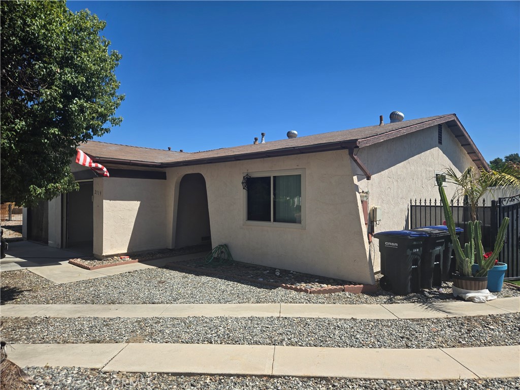 Bring your clients to this well-maintained property. Property features two good size rooms with their own closets and ceiling fans. One bathroom with bathtub and glass sliding door. Property has a possibility for RV parking on the right-hand side making it one of the most desirable homes in the community. With a bigger than the other homes in the community, lot of 5227. Property count with newer windows and two sliding doors, one from one of the bedrooms and the other one off the living room area. As you enter the home you will find a living room and dining room area with ceiling fans in both areas to keep you cool. Back yard features a large patio area with concrete floors. Also, you will find a metal shed to keep all your tools. Buyer and buyers and buyer's agent to investigate via inspections from professionals regarding square footage, condition of the home and satisfy themselves with their investigations. square footage was not taped or verified.