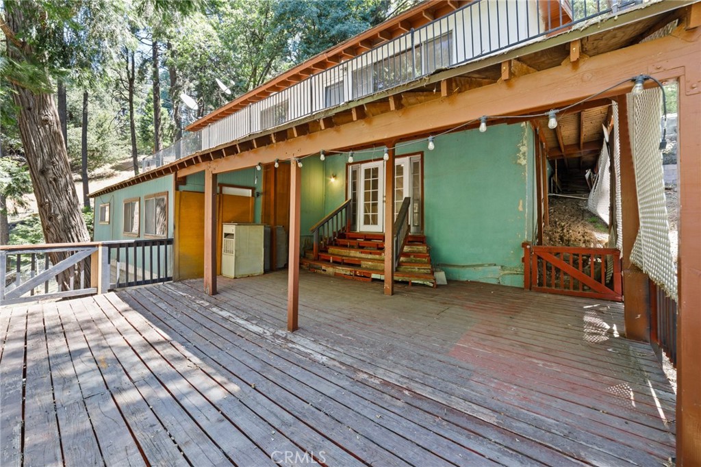 The Perfect Mountain Escape Awaits
Tucked between the serene waters of Lake Arrowhead and Lake Gregory, this charming cabin is your gateway to peace, adventure, and year-round beauty in the heart of the San Bernardino National Forest.
With 2,449 sq. ft., this warm and inviting home features 4 bedrooms and 3 bathrooms, offering plenty of space for families or guests. Step inside to a light-filled living area with soaring ceilings, a cozy stone fireplace, and windows that frame breathtaking views of the surrounding forest.
The cozy kitchen is both functional and welcoming, offering ample storage and space for all your family gatherings and holiday meals. It’s the heart of the home—perfect for creating memories that last a lifetime.
Outside, relax on your oversized deck, breathe in the fresh mountain air, and soak in the sights and sounds of nature all around you.
Whether you’re looking for a weekend getaway, vacation rental opportunity, or forever home—this cabin delivers the lifestyle you’ve been dreaming of.