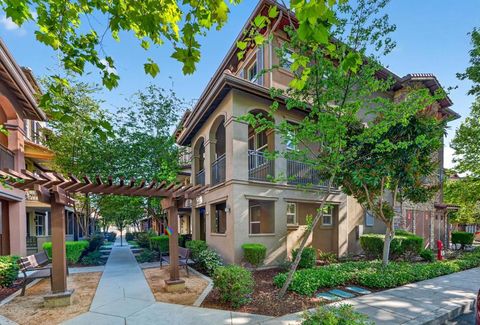 Photo of 499 Calabria Place, San Jose, CA 95128 (MLS # ML82043634)