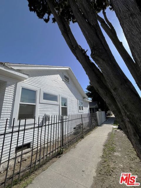 Photo of 1058 W 42nd Place, Los Angeles, CA 90037 (MLS # 26656829)