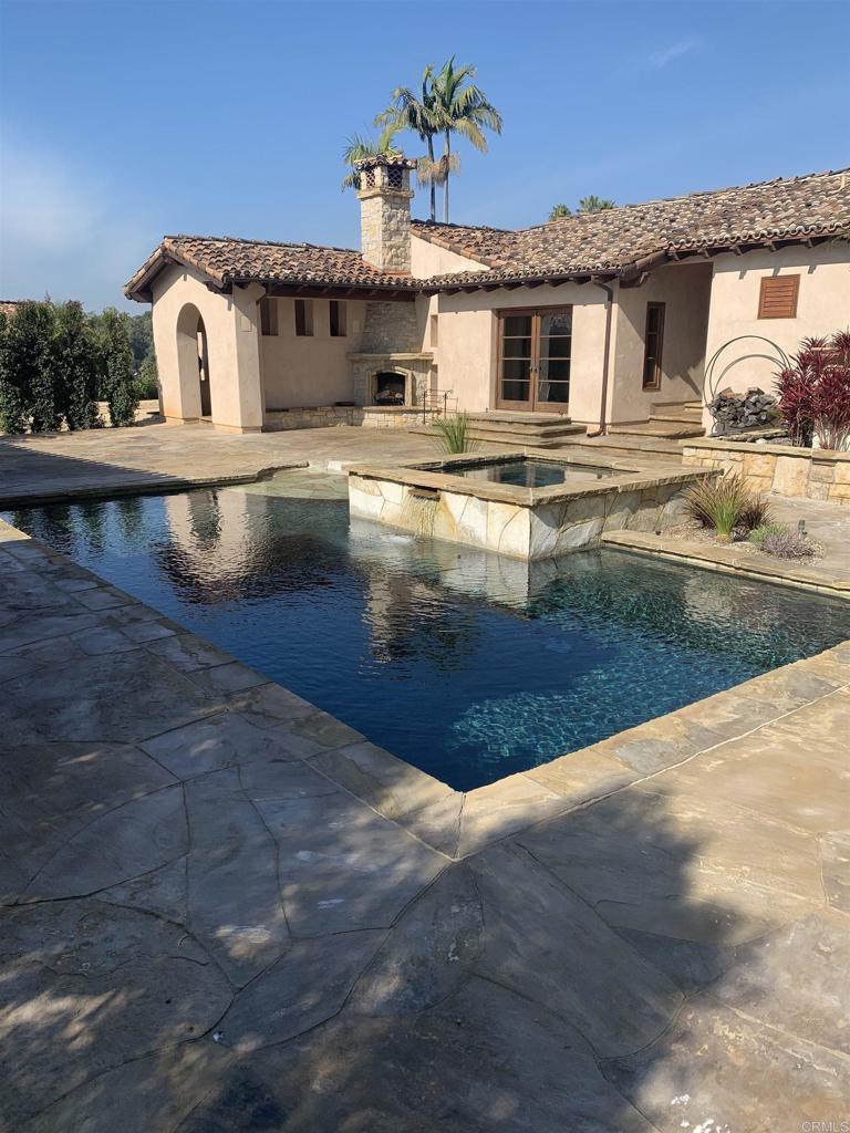 Beautifully remodeled home in the Covenant of Rancho Santa Fe with Phenomenal VIEWS on a fully usable ~3-acre lot. Prime location- one of the best streets in RSF Covenant! 4 bedrooms, and 3 baths in the main house and a newer one-bedroom and full-bath in the guest house, plus a gym and an additional 2 dens. Very private, with excellent sun orientation, and fully fenced in and gated. Includes a swimming pool, outdoor dining, fireplace, and BBQ. Multiple patios with expansive VIEWS, exercise and massage room, vaulted ceiling, great layout for indoor-outdoor living, detached 3 car garage, on sewer. Nearby Roger Rowe School, Covenant golf & tennis, and trails. The 4th bedroom in the main house does not have closet.