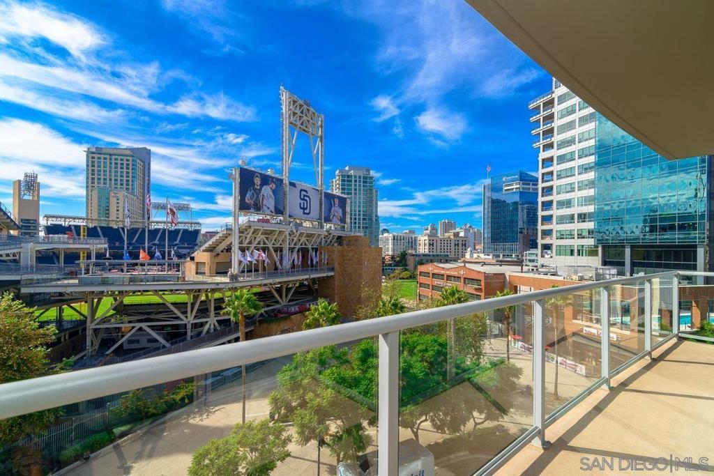 Knock it out of the park for the win with this Ballpark View Condo at Park Terrace in the East Village! Perfectly perched on the 6th floor, this West facing condo features a spacious open concept floor plan, oversized windows that bathe the interiors with natural light, and a great flex space that could be used as a den, office, or 2nd bedroom. The larger primary bedroom offers a plethora of creative layout possibilities while the wrap-around balcony is fantastic for enjoying the panoramic sunset views, Petco Park festivities, and fireworks! Included with this home is a rare and private storage space only a few feet from your 2nd level underground parking spot. Furthermore, the location contributes beautifully to the Downtown San Diego lifestyle. You will be a short distance from Petco Park, Gallagher Square, Gaslamp Quarter, the Central Library, Bus & Trolley Transportation, FIT Athletic Gym, and the Harbor Drive Pedestrian Bridge which leads to The Rady Shell, the Convention Center, Seaport Village, Embarcadero Parks, the Coronado Ferry, and more! The Park Terrace community offers 24-hour security, a fully-equipped fitness center, a 2nd-level rooftop terrace w/ BBQs, a recreation room, interior courtyard seating, bike rack storage, and a modern lobby entrance. ...storage space only a few feet from your 2nd level underground parking spot. Furthermore, the location contributes beautifully to the Downtown San Diego lifestyle. You will be a short distance from Petco Park, Gallagher Square, Gaslamp Quarter, the Central Libray, Bus & Trolley Transportation, FIT Athletic Gym, and the Harbor Drive Pedestrian Bridge which leads to The Rady Shell, the Convention Center, Seaport Village, Embarcadero Parks, the Coronado Ferry, and more! The Park Terrace community offers 24-hour security, a fully-equipped fitness center, a 2nd-level rooftop terrace w/ BBQs, a recreation room, interior courtyard seating, bike rack storage, and a modern lobby entrance. Complex Features: ,,,,, Equipment: Dryer,Fire Sprinklers, Washer Sewer: Sewer Connected, Public Sewer