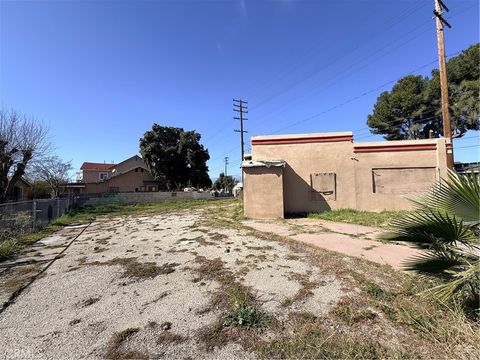 Photo of 1003 W Rialto Ave, San Bernardino, CA 92410 (MLS # CV26023905)