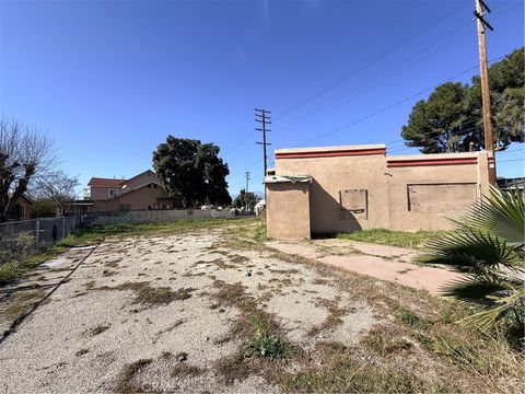Photo of 1003 W Rialto Ave, San Bernardino, CA 92410 (MLS # CV26023905)