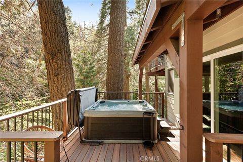 Photo of 576 Kuffel Canyon Rd, Lake Arrowhead, CA 92352 (MLS # IG26056188)