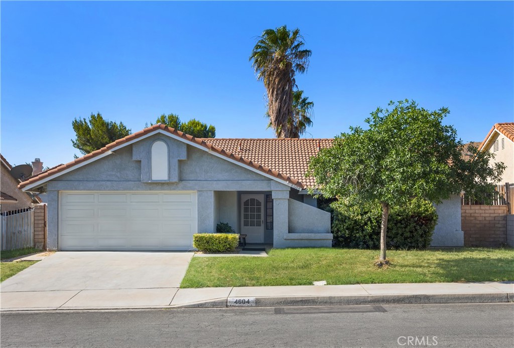 Welcome to 4604 Paseo Hermoso, a well-maintained three-bedroom, two-bathroom home in the desirable Rancho Vista Neighborhood of Palmdale. Boasting a semi-open floor plan updated with new, stylish hardwood floors, the interior is perfect for buyers seeking move-in-ready convenience. High vaulted ceilings, large windows, and generous living spaces work together to create a bright, airy feel. The home sits on a nice-sized lot with plenty of yard space perfect for creating the garden of your dreams. There is a newer HVAC system installed to keep you cool during those warm California summers, and a fireplace for cozening up when it's chilly out. Situated in a friendly neighborhood with easy access to good schools, parks, shopping, dining, and golf, this could very well be your dream home. Come take a look while it's still available.