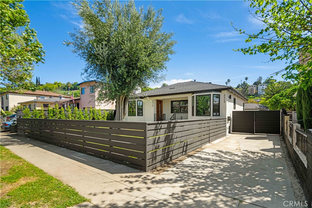 TWO HOMES ON ONE LOT** **LIVE SMART: RENT 1 & LIVE IN 1: Step into El Sereno, the much-desired 90032 zip code, perfectly positioned next to Monterey Hills, Montecito Heights, University Hills, Alhambra, South Pasadena and a short commute to all Downtown LA neighborhood hubs. 4926 Templeton (SF: 1,277) is a stunning newly remodeled single family home featuring 3-bedrooms, 2 bathrooms plus an independent attached flex room with separate entrance including laundry hook ups, laminate wood flooring. Escape the city buzz in this sleek, sun-drenched home offering modern amenities like the star of the home, a custom marble fireplace wall in the living area, two stunning full size bathrooms with designer tile & built in bluetooth speakers, new roof, new central/hvac unit, new double pane windows throughout, too much to list. Unit 4924 Templeton (SF: 600) is a functional NEWLY BUILT ADU, 2 bedrooms, 1 bathroom with its independent address and a dedicated yard area that is ideal for al-fresco entertainment year round. Units are detached with individual yards for summertime family gatherings. Whether you're an owner-occupier who can offset costs by renting one unit while living in the other, or an investor aiming for consistent rental income from both units, this property offers significant potential. This is your dream investment property, there is growth everywhere you look here: lock it up before it goes! Whether you're planting roots or building your portfolio, this is more than just real estate it's your first step or next step to wealth and prime living. Attention all hikers, foodies, coffee enthusiasts, you'll enjoy close proximity to the Elephant & Ascot Hills hiking trails, Guardia Park, Hermon Park, Lil East Coffee, Holy Grounds Coffee & Tea, The Village Mart, Zingo Tacos, Secret Pizza, Benny Boy Brewing, Genovese's Italian Kitchen and the recently opened El Sereno Children's Museum! Book your tour today, El Sereno is ultra-hot and now is the time to take advantage of the current interest rate improvement. Property meets all FHA, VA, CONV loan requirements! Lot size 7,164 with enough parking for each unit.