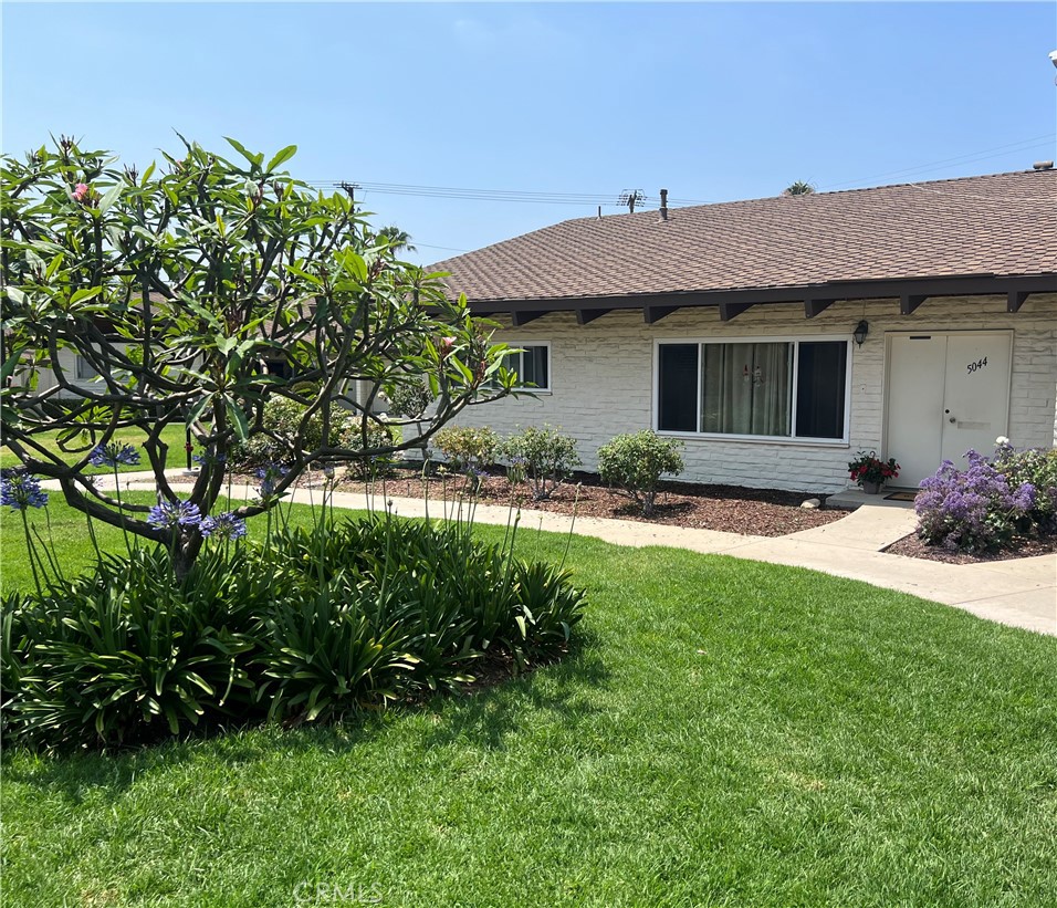 Located in the heart of Yorba Linda, this spacious single level condo offers a prime location just a short walk from Yorba Linda Town Center, restaurants, shopping, entertainment, libraries, parks, horse trails, and walking paths. This 3-bedroom, 2-bath home features an oversized, light-filled living room with high ceilings, a remodeled kitchen with modern appliances, nice size dinning area, den/office, updated bathrooms and ample storage. The layout includes 3 convenient entry-level bedrooms. Newer windows and sliders. Enjoy the beautiful and picturesque view from the front window of the lovely landscaped and tree-lined community grounds. The community is beautifully maintained with lush gardens and meandering paths, offering a peaceful and welcoming environment. HOA includes pool, ground maintenance, trash and water. Best priced per square foot in the area!