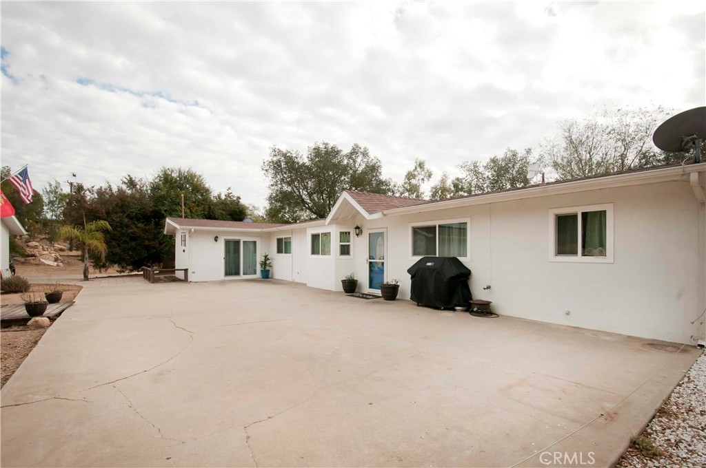 Discover this stunning 4-bedroom, 2-bathroom home nestled on over 2.5 usable acres with tiered views overlooking the entire property. Enjoy breathtaking ocean views from the back porch, offering a relaxing scene of the California coast. The open floor concept seamlessly connects the kitchen, dining, and living areas—featuring ample cabinet space, quartz countertops, stainless steel appliances, recessed LED lighting, a new aluminum porch cover, and solar roof venting.
The gorgeous bathrooms, energy-efficient windows, and oversized 3-car garage complement the home’s comfort and style. Additional highlights include two large storage sheds—one with a tranquil view of the pool and yard—a Generac 24kW standby generator with Wi-Fi, an 11.578 kW solar panel system, and numerous mature fruit trees such as grove, macadamia, and pomegranate.
Relax under an oak swing among over 20 large oaks, enjoy the inviting 450 sq ft pool with a Baja shelf, lap lane, night lights, and Pebble Tec lining—perfect for cooling down on warm days. The property also offers room to build an ADU or guest house, plenty of RV parking, and beautiful park-like landscaping—all fully fenced.
Additional amenities include a large energy-efficient home with gorgeous foliage, warm breezes, and year-round mild weather. Just 15 minutes from Camp Pendleton, wineries, and endless activities, this picturesque retreat combines serene natural beauty with modern comfort and flexibility.