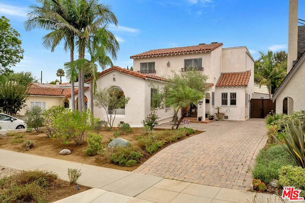 Ideally located in the heart of Rancho Park, this timeless Spanish-style home combines classic charm with modern convenience. Just steps from Overland Avenue Elementary- home to LAUSD's top-ranked school district and minutes from Rancho Park Golf Course, the Griffin Club, UCLA Research Center, Sawtelle, and all that Westside has to offer, the location is truly unmatched. Inside, the light-filled formal living room flows seamlessly into the dining area, family room, and spacious open kitchen. French doors lead to a lush, verdant backyard perfect for outdoor dining and effortless entertaining. With 5 bedrooms and 3 bathrooms, this home offers plenty of space for comfortable living. Adding to its versatility, a sizable detached flex space awaits your personal touch, ideal as a home office, studio, or guest retreat. Don't miss the chance to make this one-of-a-kind home yours!