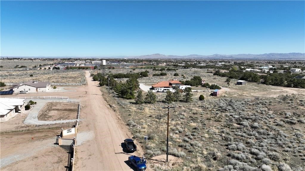 Spacious 2+ Acre Lot in Oak Hills – Ready to Build or Invest
This is a rare opportunity to own over 2 acres of prime land in the highly desirable community of Oak Hills, California. Perfect for building your dream home or holding as a long-term investment, this property offers the space, location, and infrastructure to make your vision a reality.
Utilities on Site – Water and electricity are already at the property line, significantly reducing development costs and timelines.
Build-Ready Terrain – Mostly flat and usable land, ideal for custom construction, ranch-style living, or equestrian use.
Top-Rated School District – Located near some of the best schools in the High Desert area, making it a great location for families.
Easy Freeway Access – Just minutes from the 15 Freeway, providing a smooth commute to Victorville, Rancho Cucamonga, and the greater Inland Empire. Peaceful and Private Setting – Enjoy open skies, mountain views, and a quiet atmosphere while still being close to shopping, dining, and essential services.
Oak Hills is known for its custom homes, wide-open spaces, and strong sense of community. With land in this area becoming increasingly scarce, this property presents a valuable opportunity for both homeowners and investors.