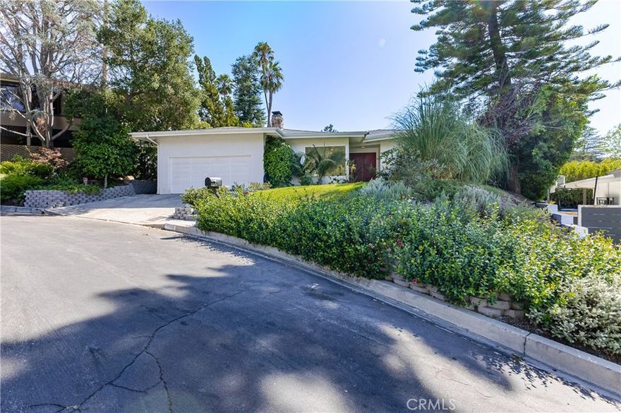 Short term lease located on a quiet cul-de-sac in the highly sought after Donas neighborhood. This tastefully updated single-story home offers the perfect blend of comfort, style, and convenience. Designed with an open concept layout filled with natural light, the home features a formal entry, a spacious living room with a fireplace, and a family/dining area that flows seamlessly into a modern kitchen with Carrara marble countertops and stainless steel appliances. Recent upgrades include new hardwood floors, multiple skylights, a freshly painted interior, and a remodeled hallway bathroom. The primary suite features a walk-in closet and en-suite bath with a spa tub and separate shower. Step outside to a private backyard oasis with a sparkling pool with waterfall feature, a spa, two grassy areas, and a large covered patio, perfect for year-round entertaining. Conveniently located with easy access to the Westside and the Fryman Canyon trailhead, this home offers relaxed California living in a prime Studio City location.